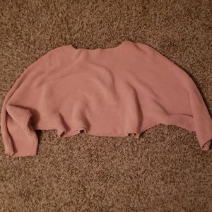 Pink cropped sweater.